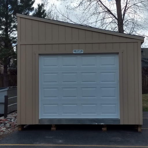 permanent wood garage - not as pictured - shed city usa